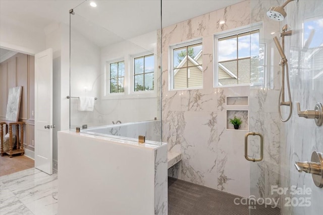 bathroom with a shower with door and vaulted ceiling