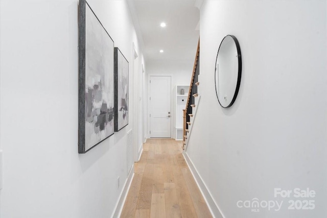 hallway featuring light hardwood / wood-style flooring