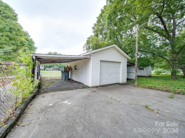 garage with a lawn