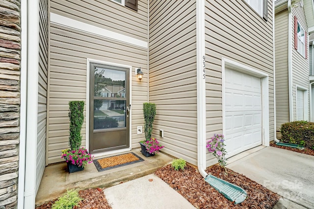 property entrance featuring a garage