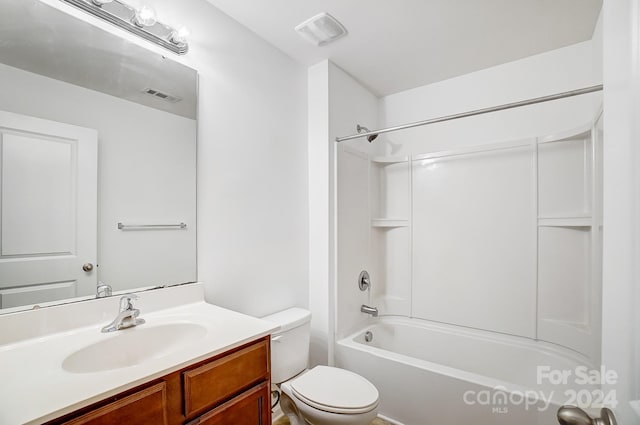 full bathroom featuring vanity, shower / bath combination, and toilet