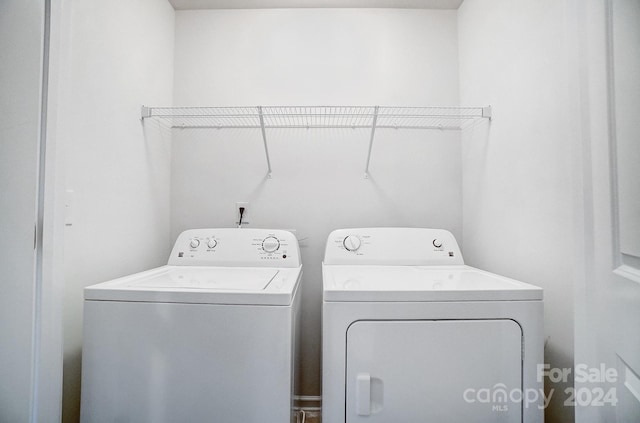 laundry area featuring independent washer and dryer