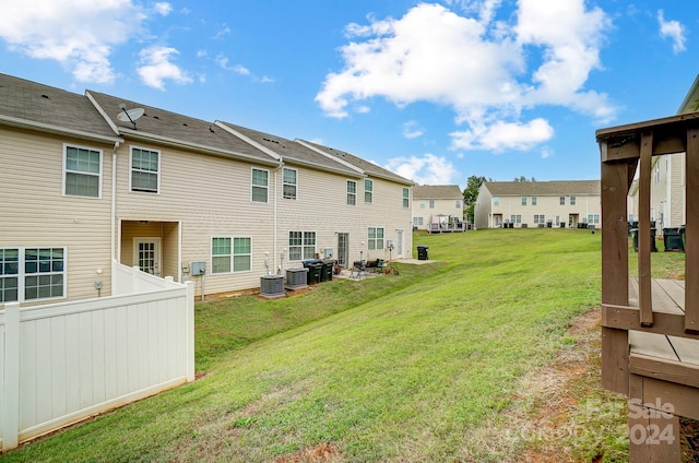 view of yard with central AC