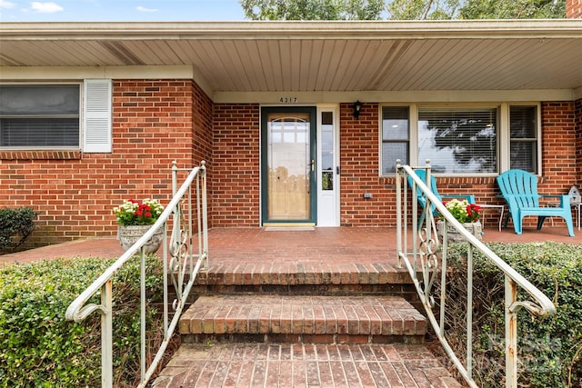 property entrance featuring covered porch