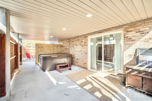 view of patio featuring a hot tub