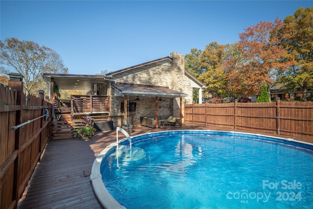 view of pool featuring a deck