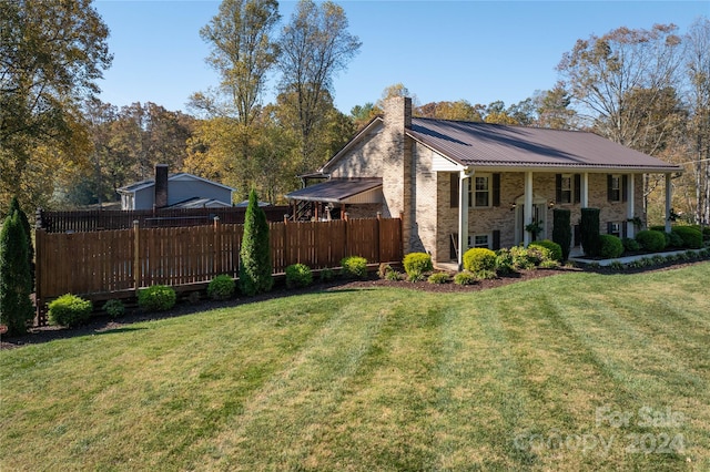 exterior space featuring a yard