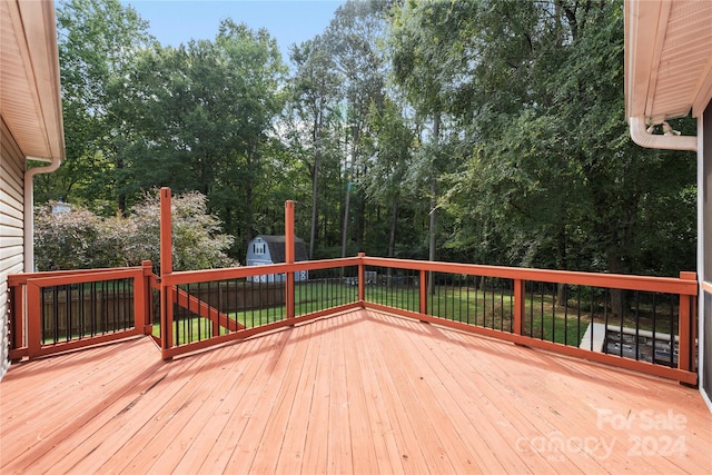 wooden deck with a yard