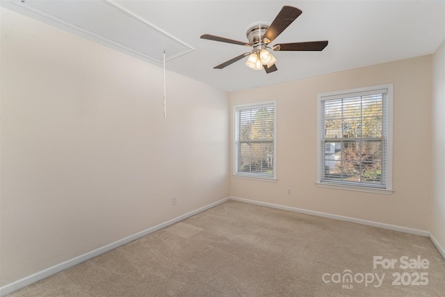 empty room featuring light colored carpet