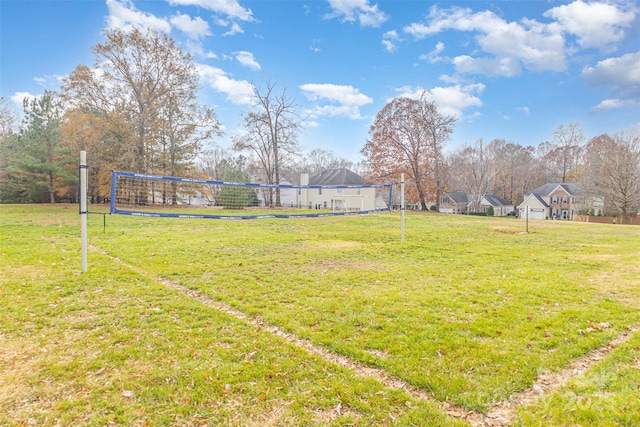 view of yard featuring volleyball court