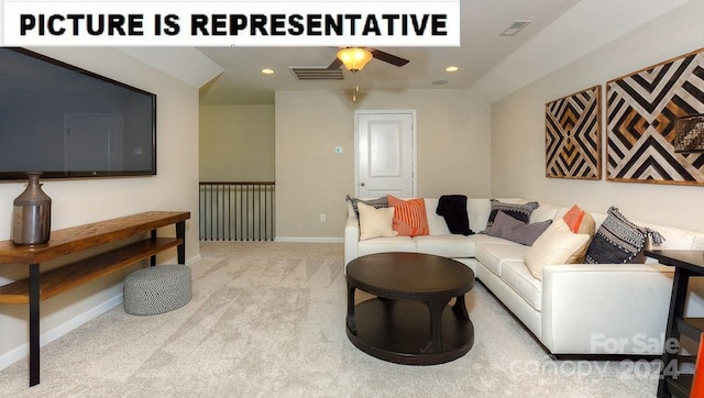 carpeted living room with ceiling fan