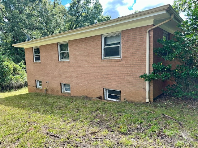 view of property exterior featuring a yard