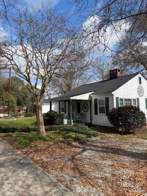 view of front of property with a chimney