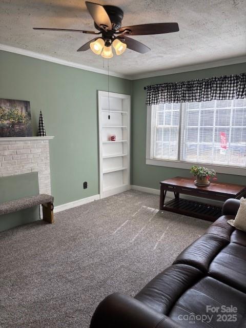 living area featuring a textured ceiling, baseboards, carpet flooring, and crown molding