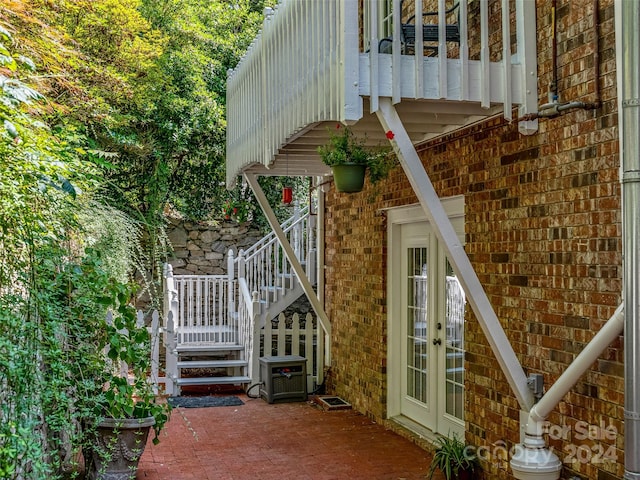 doorway to property featuring central AC