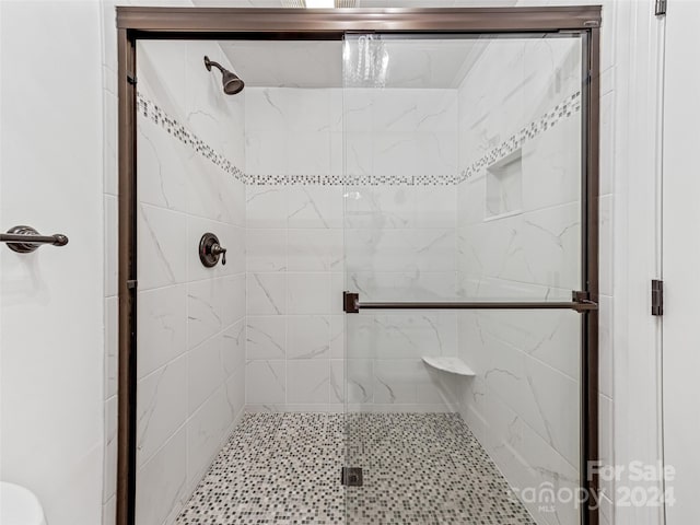 bathroom with walk in shower