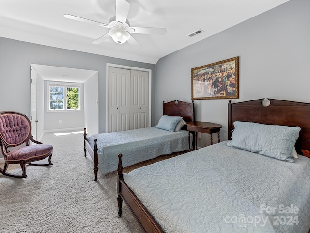 bedroom featuring carpet flooring, a closet, and ceiling fan