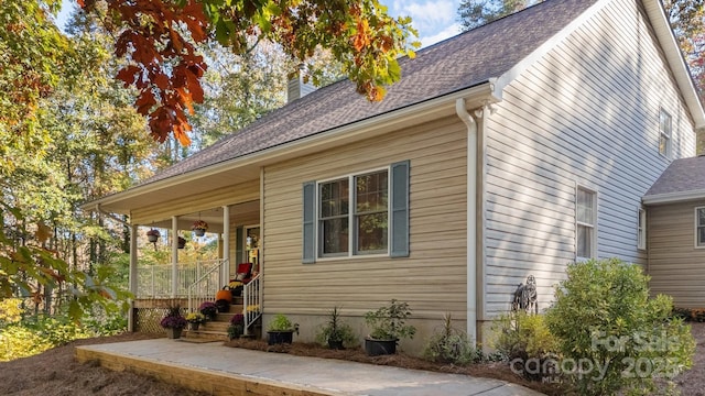 view of home's exterior featuring covered porch