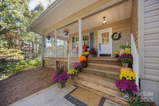 entrance to property with covered porch