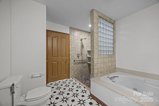 bathroom featuring toilet and shower with separate bathtub