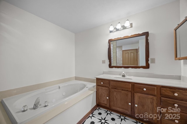 bathroom with a tub to relax in and vanity