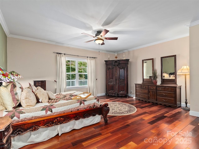 bedroom featuring ceiling fan, dark hardwood / wood-style flooring, and crown molding