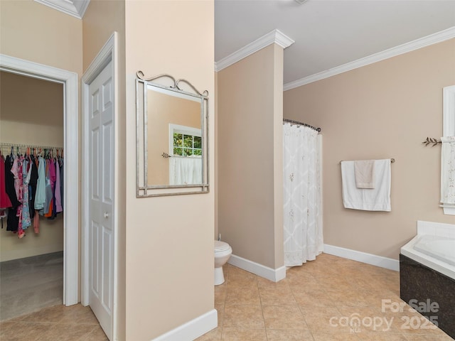 bathroom with tile patterned flooring, toilet, and ornamental molding