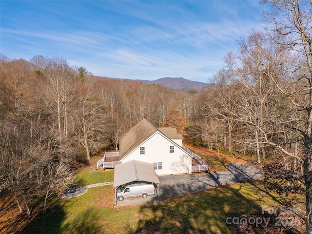 drone / aerial view featuring a mountain view