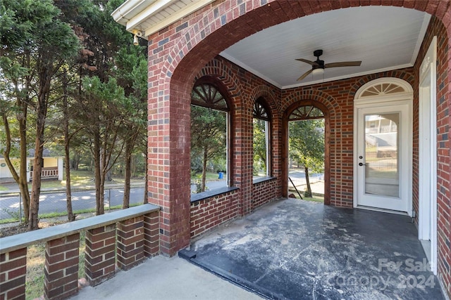 view of patio featuring ceiling fan