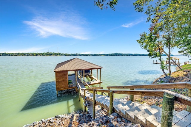 dock area with a water view