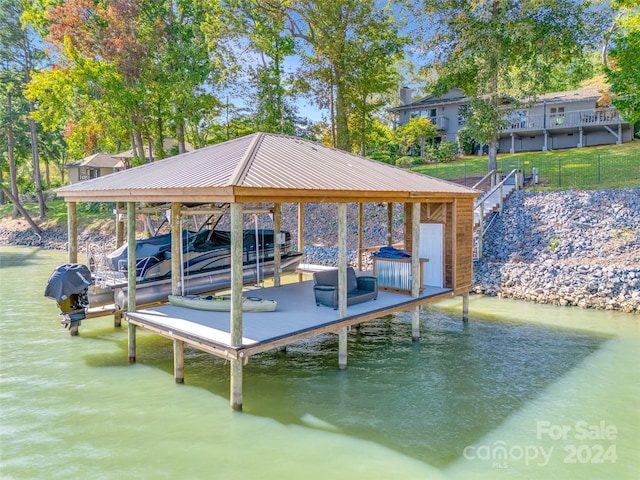 view of dock featuring a water view