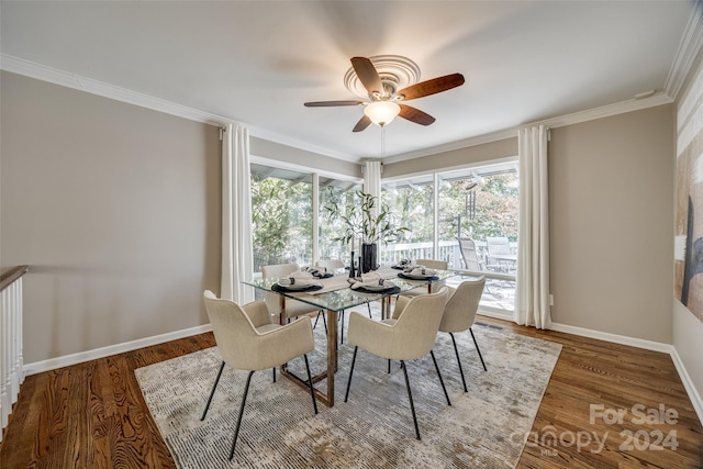 dining room with ornamental molding, hardwood / wood-style flooring, ceiling fan, and a wealth of natural light