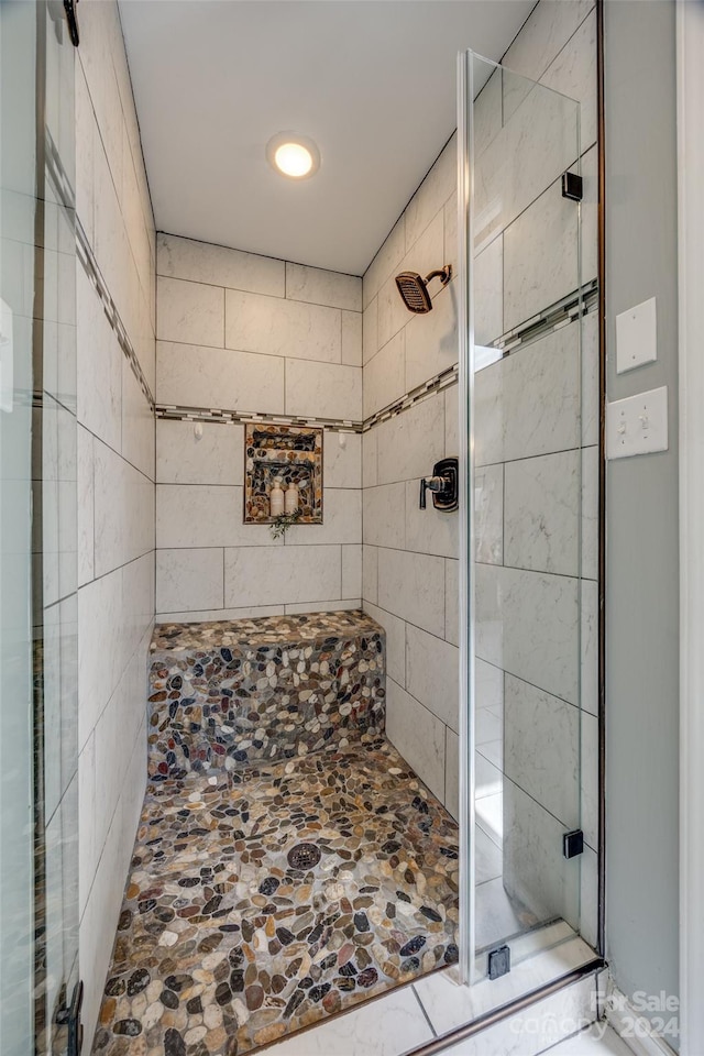 bathroom featuring walk in shower