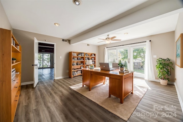 office area featuring dark wood-type flooring and ceiling fan