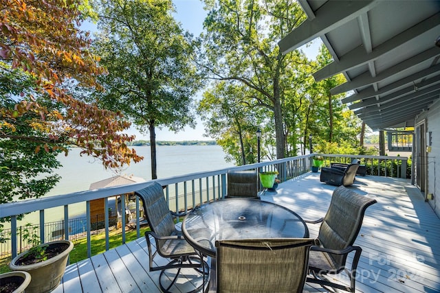 deck featuring a water view