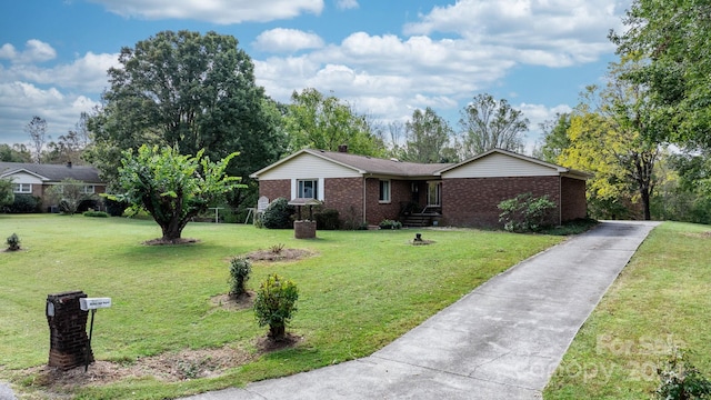 ranch-style house with a front yard