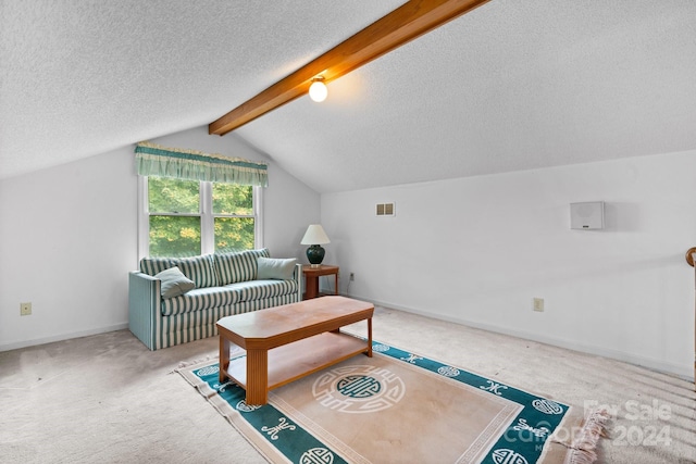 interior space with lofted ceiling with beams, a textured ceiling, and carpet floors