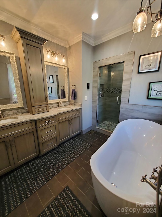 bathroom featuring crown molding, independent shower and bath, vanity, and tile patterned floors