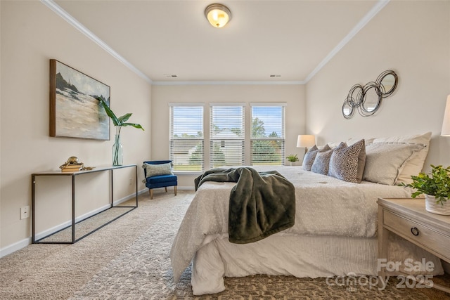 bedroom featuring visible vents, baseboards, carpet, and crown molding