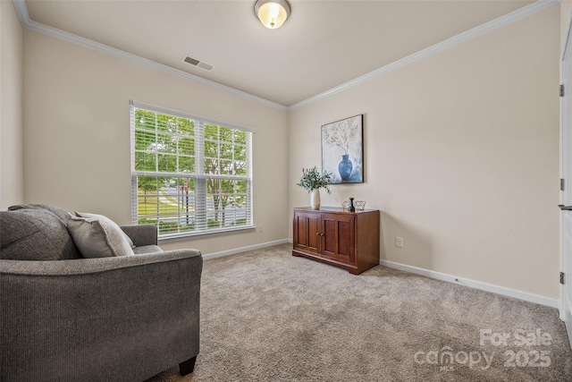 living area with visible vents, baseboards, carpet, and crown molding