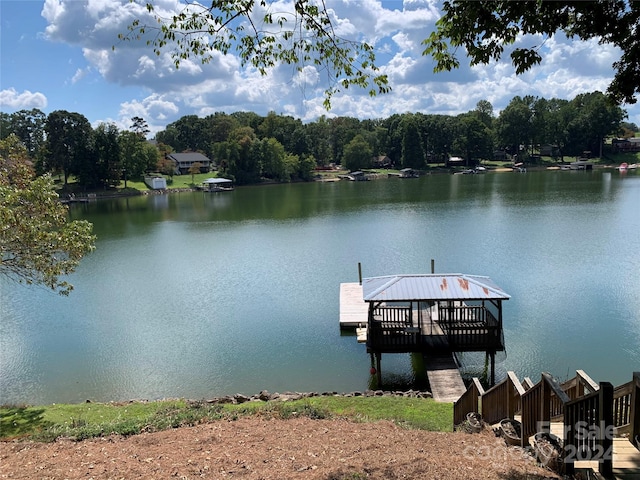 dock area featuring a water view