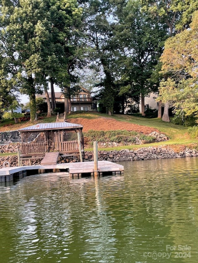 dock area featuring a water view