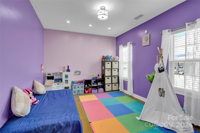 bedroom with wood-type flooring