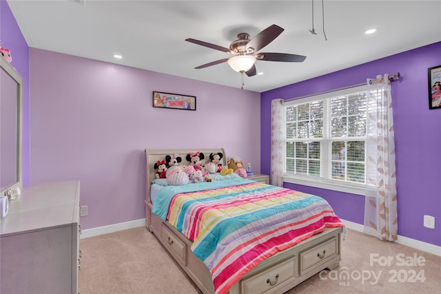 carpeted bedroom with ceiling fan