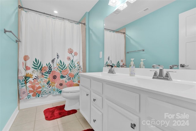 full bathroom featuring vanity, toilet, tile patterned floors, and shower / bath combination with curtain