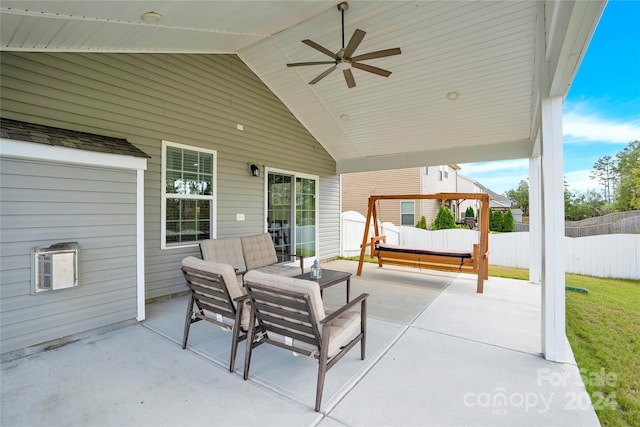 view of patio featuring ceiling fan, an outdoor living space, and a gazebo