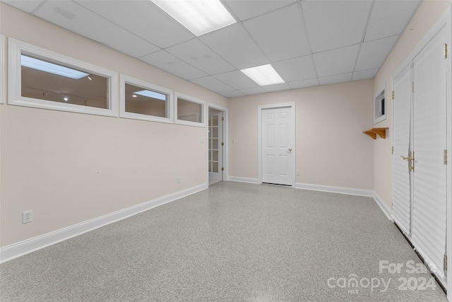 basement with a drop ceiling