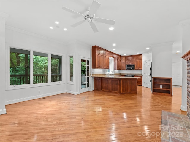 85 Tall Poplar Smt, Hendersonville, NC 28739 - kitchen featuring black microwave, crown molding, open floor plan, light wood-style flooring, and recessed lighting