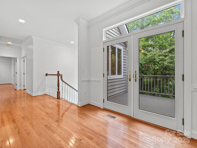 85 Tall Poplar Smt, Hendersonville, NC 28739 - spare room featuring light wood-style floors, ornamental molding, and recessed lighting
