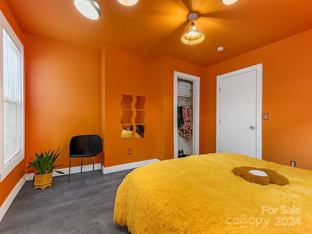 carpeted bedroom with a closet